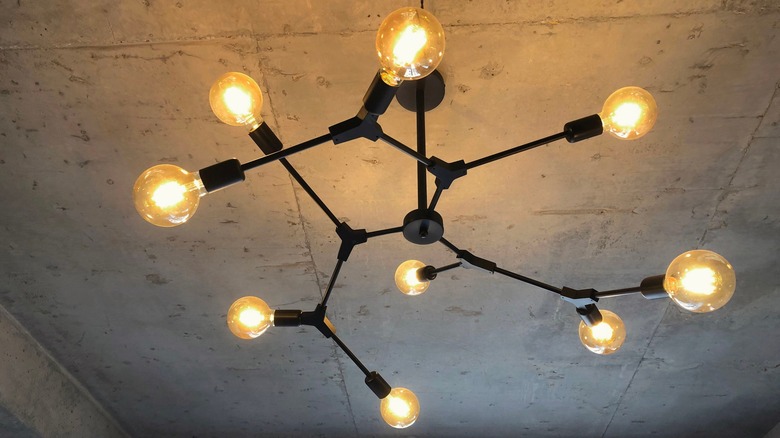 Industrial lighting on concrete ceiling