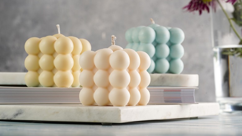 Three knobbly cube candles