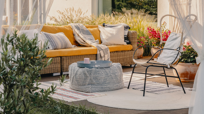 Layered rugs on patio 