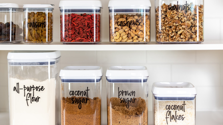 spices in plastic bins on shelf