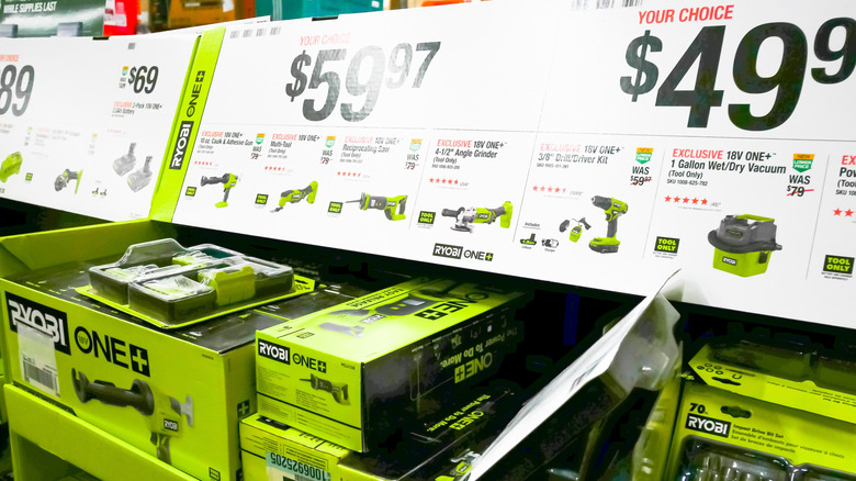 Cheap Ryobi tools in green boxes in store