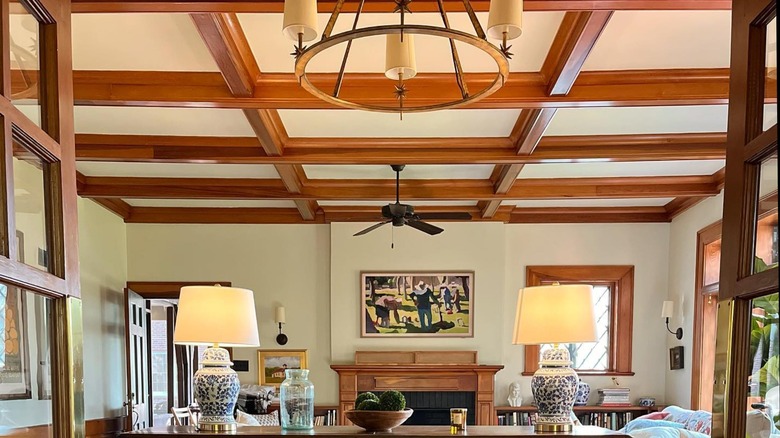 living room with wood ceiling beams