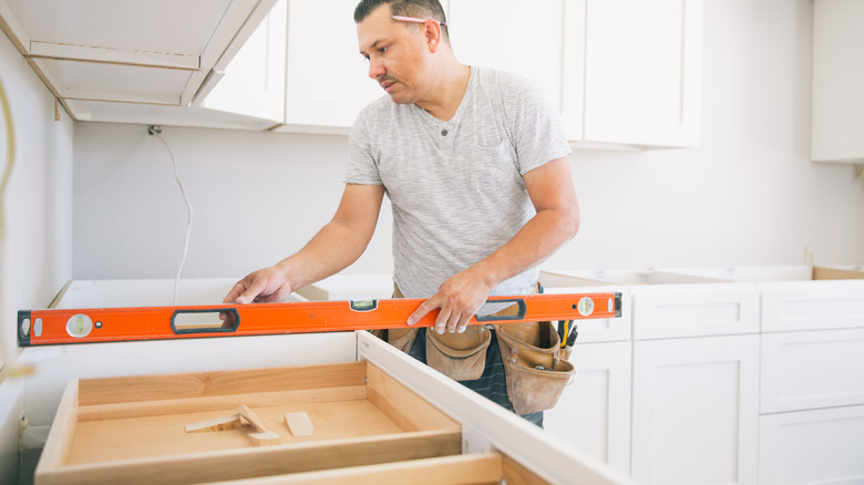 Person getting ready to install a countertop