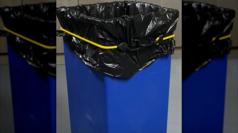 bungee cord around trash can