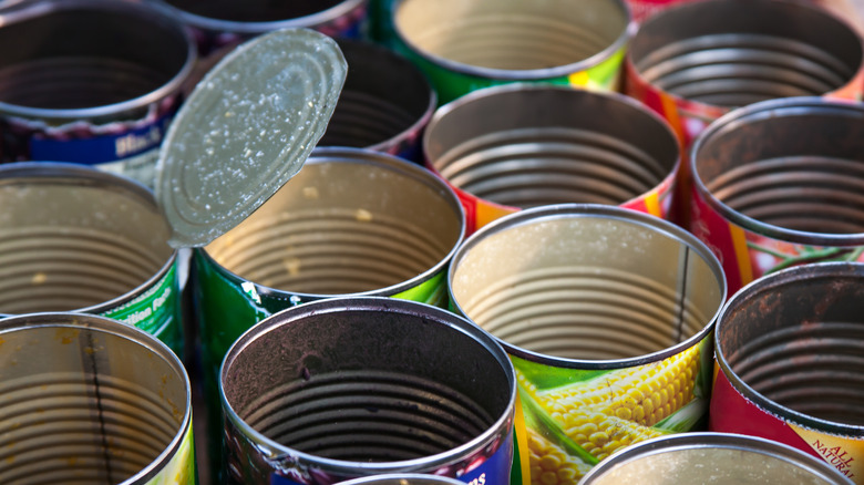 collection of empty tin cans
