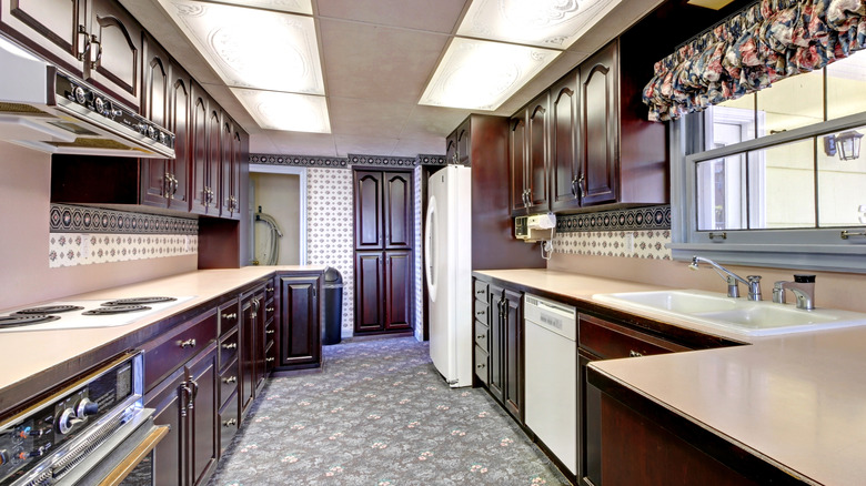 outdated kitchen dark cabinets