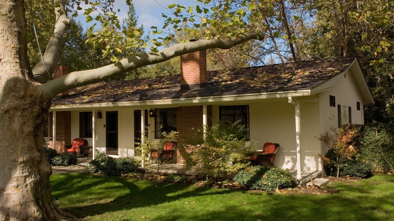 ranch style bungalow with backyard