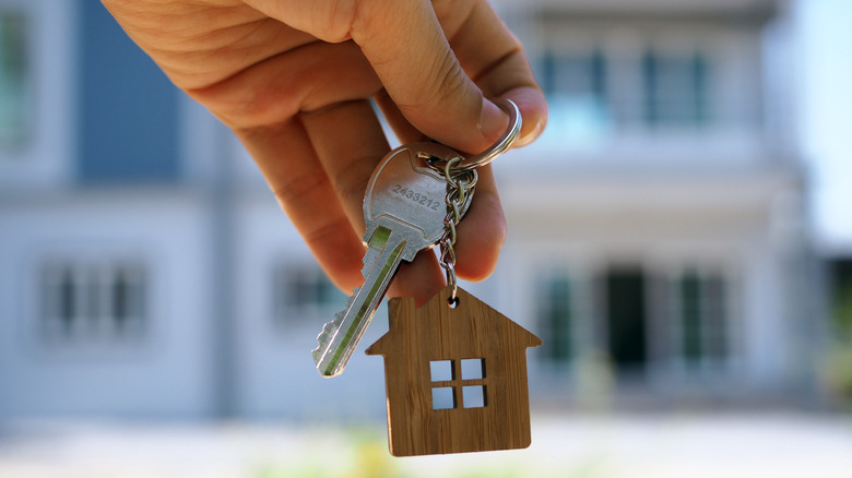 Hand holding keys