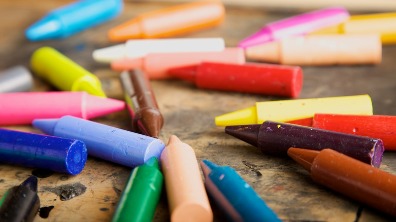 multi-colored crayons on table