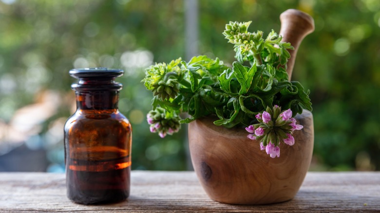 geranium and essential oil bottle