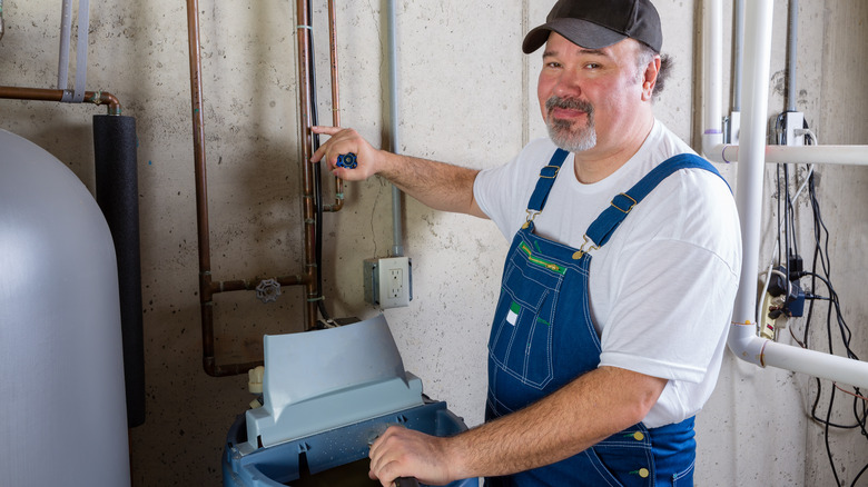 Person installing water softener