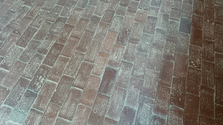 Dirty brick flooring in house