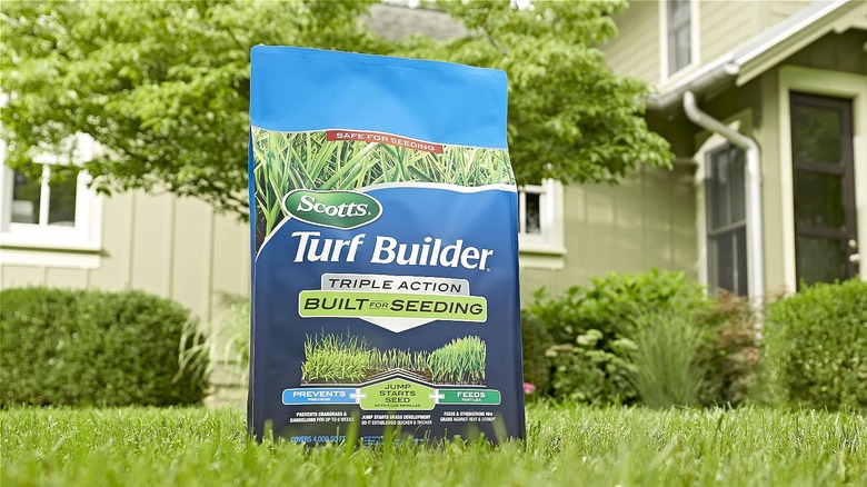 bag of fertilizer on lawn