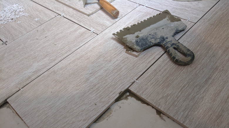 porcelain tiles being installed