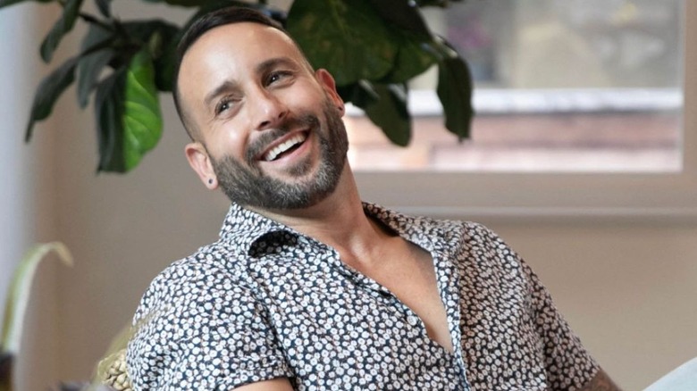 Carmine Sabatella smiling while seated