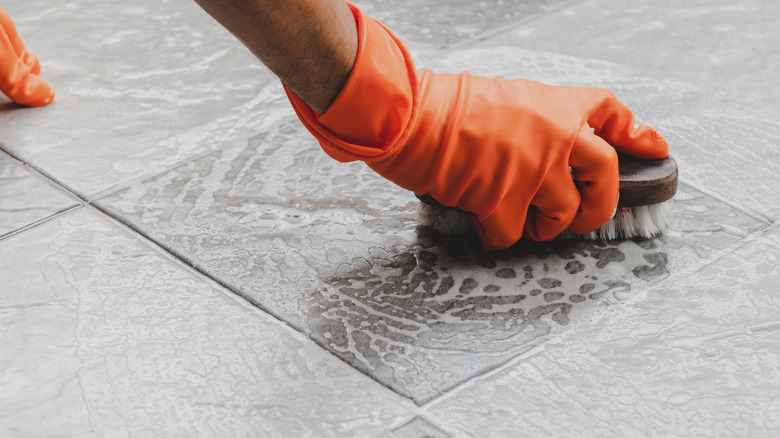 cleaning a tiled floor