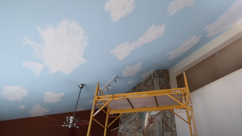 blue ceiling with white clouds