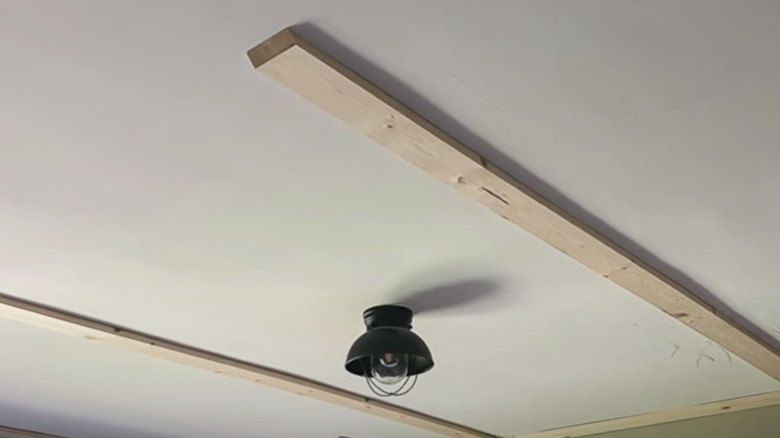 wooden planks on white ceiling