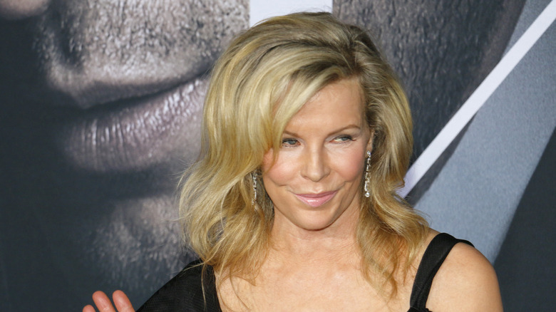 Kim Basinger waving