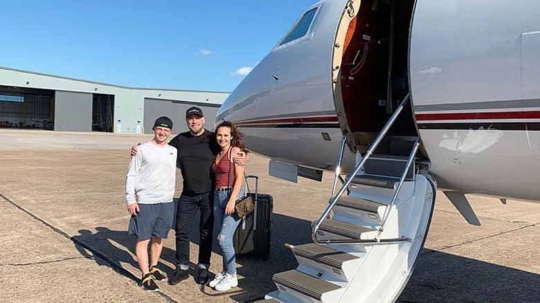 john travolta at house with plane