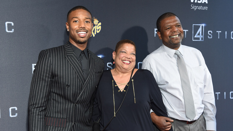 Michael B. Jordan and parents smile