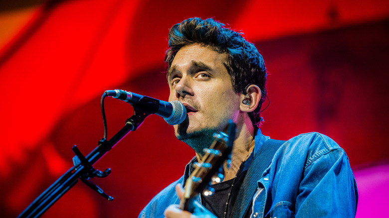 John Mayer performing on stage