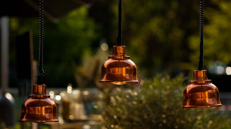 Lightly oatinaed copper hanging lights