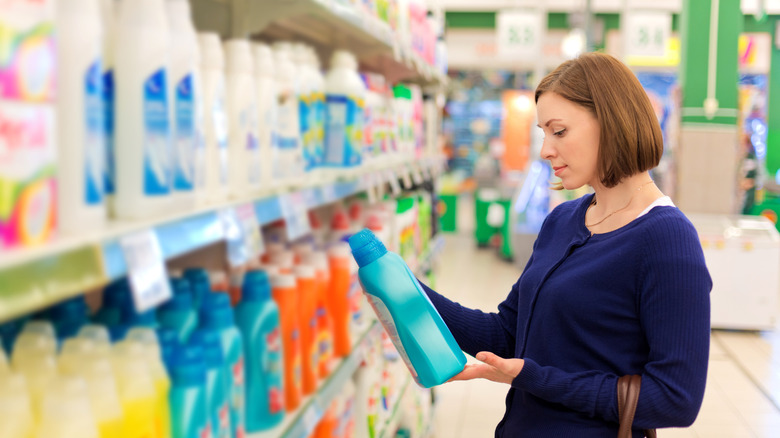 woman buying detergent