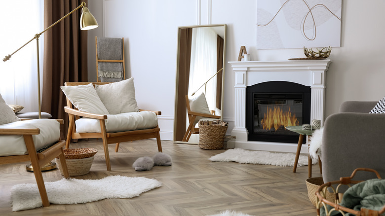 Room with white throw rugs