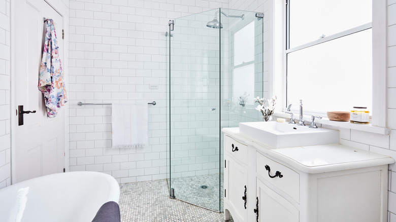 Bathroom with continuous shower flooring