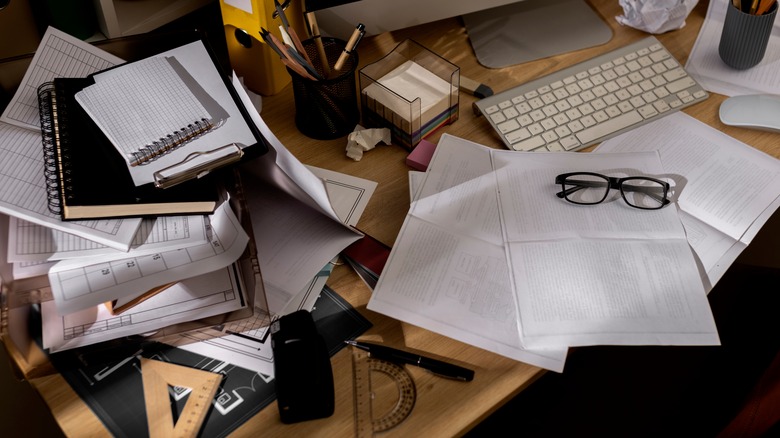 Cluttered office desk