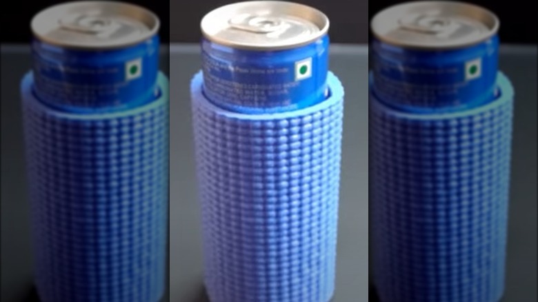 blue can koozie over can