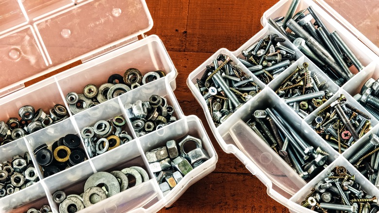 plastic containers with nuts and bolts