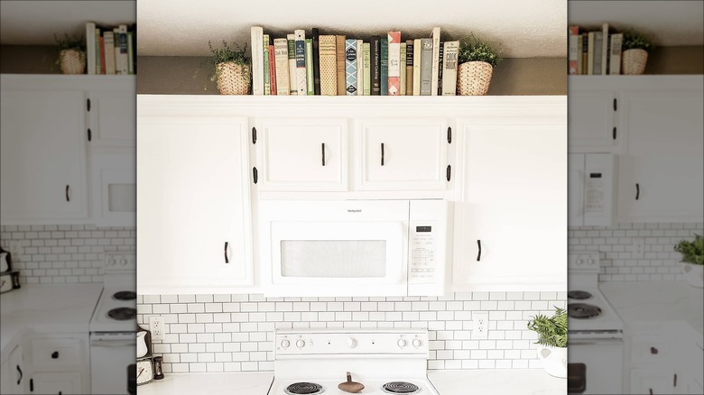 Cookbooks above kitchen cabinets