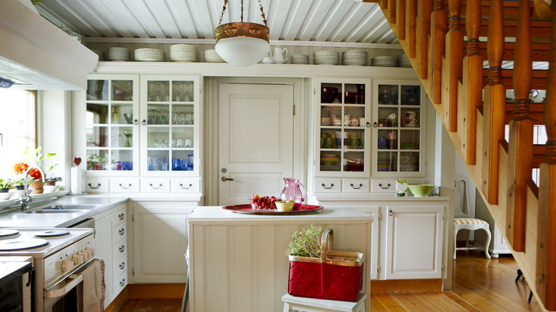 Dishes stored above cabinets