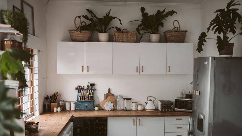 Baskets above kitchen cabinets