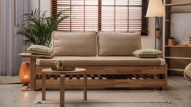 wood couch in living room