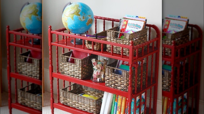 red storage shelves with children's toys