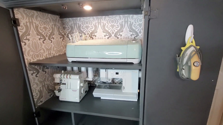 Sewing machine storage in cabinet