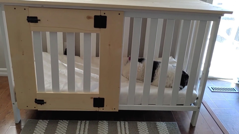 Dog crate made form crib