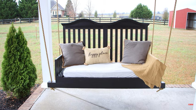 Porch swing repurposed from crib