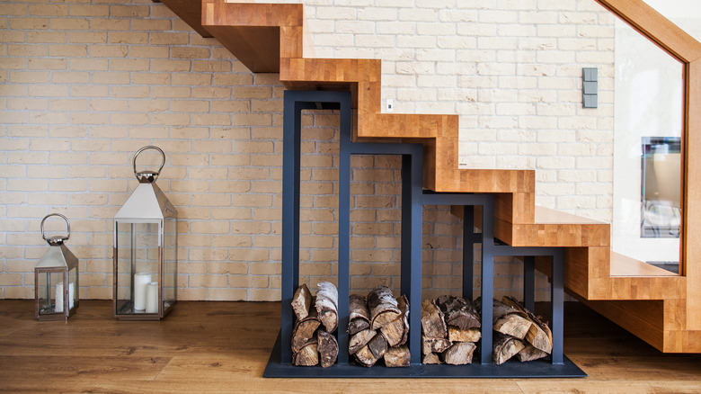 firewood shelf under stairs