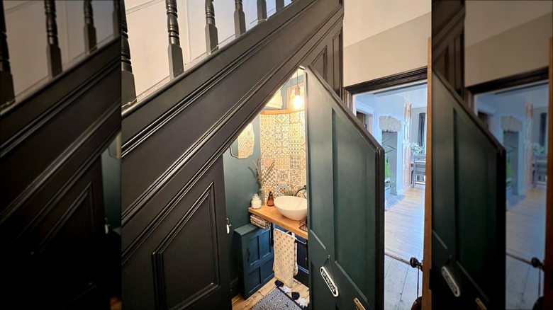 dark wood and tile half bathroom