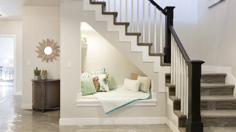 open reading nook under stairs