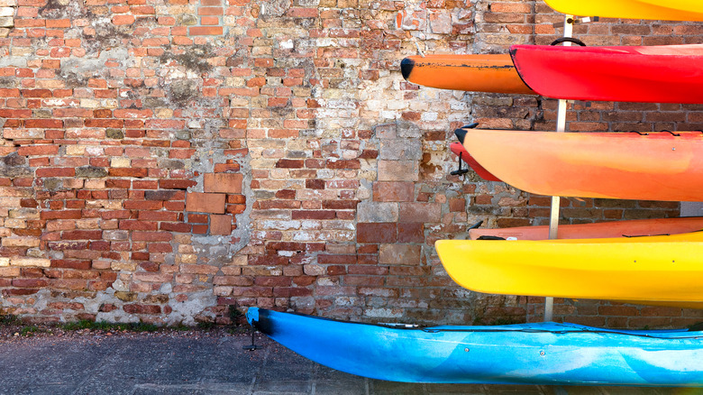 Kayaks stored on metal rack