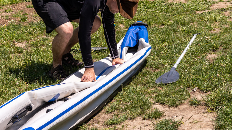 Folding an inflatable kayak