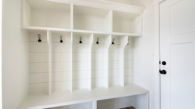 white mudroom with cubbies