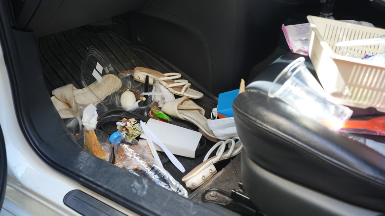 trash on floor of car