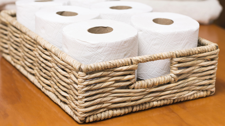 toilet paper rolls in basket