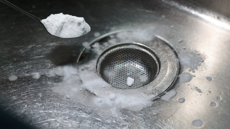 Putting baking soda in sink